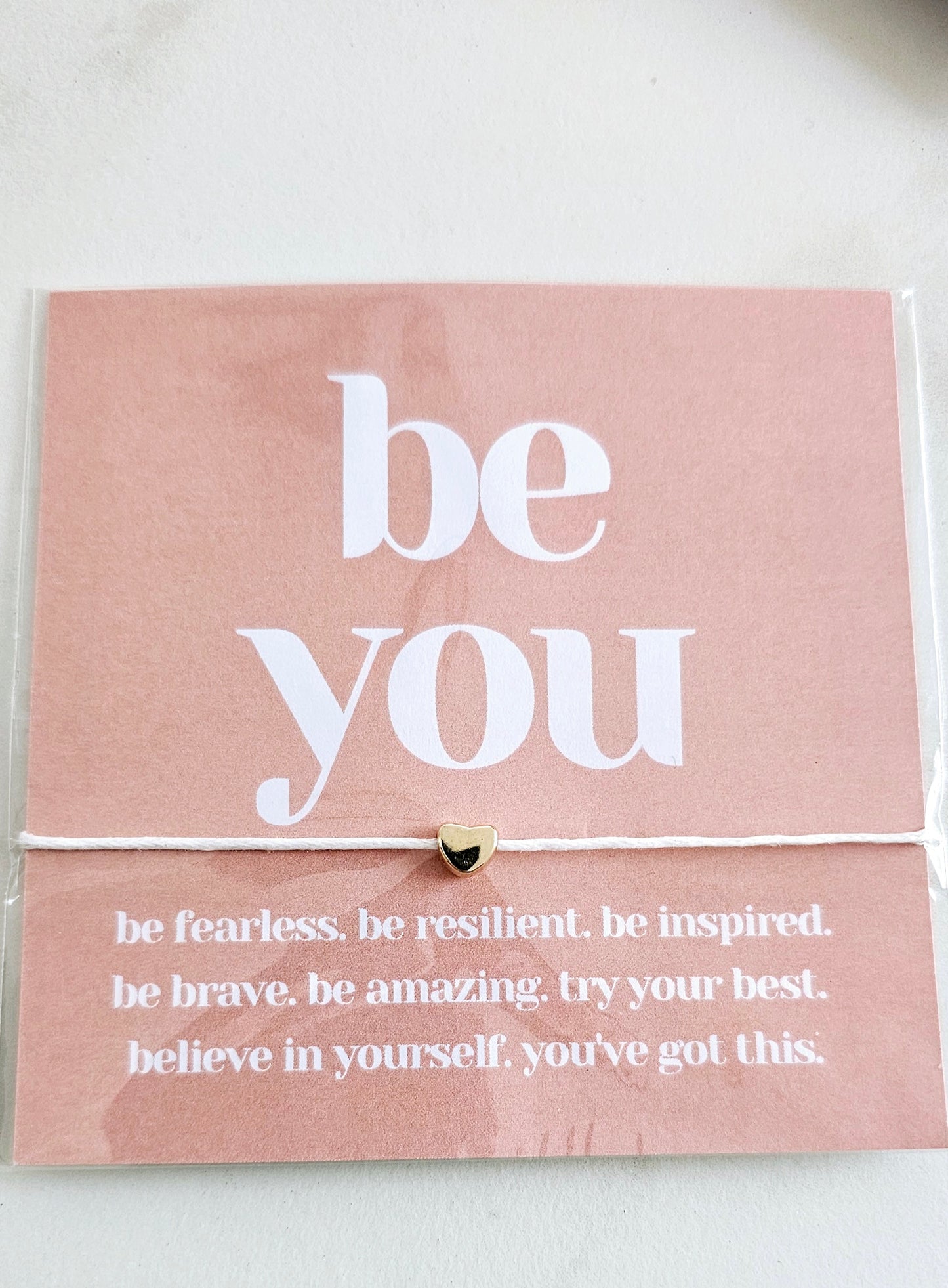 'Be You' charm and message